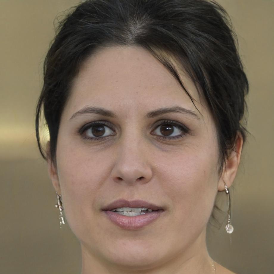 Instructor Leena Saarinen reviewing student project work